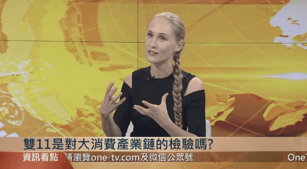 Ashley Dudarenok speaking on a televised news program about China’s consumer economy and Double 11 shopping trends