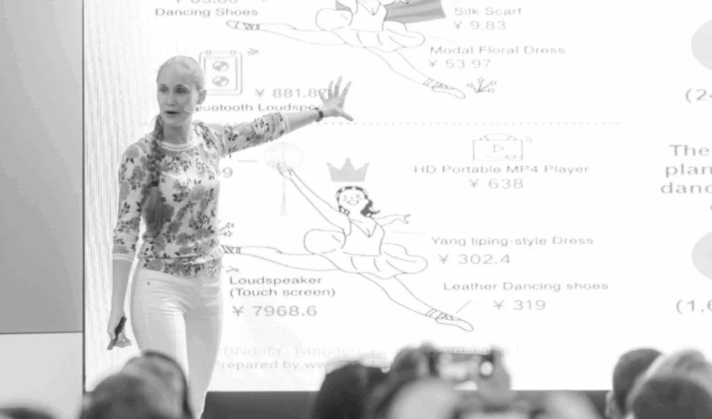 Ashley Dudarenok presenting a slide on China’s digital retail ecosystem and product pricing dynamics