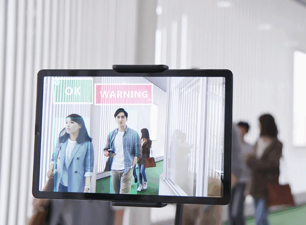 Facial recognition and smart retail technology tracking shoppers inside a modern store