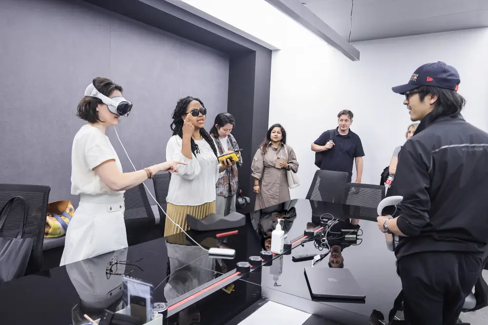 Group participating in hands-on immersive technology demonstration