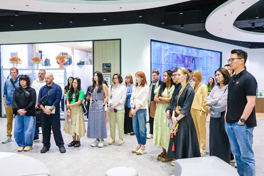 Foster Global seminar attendees in presentation session