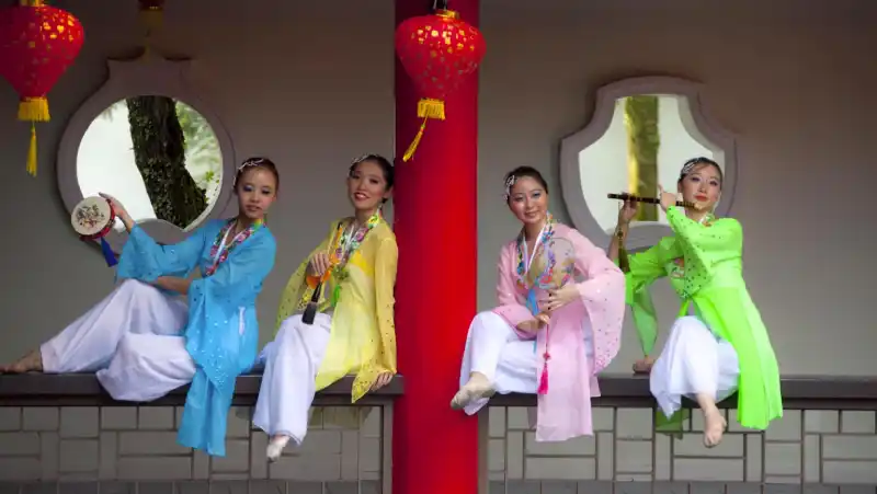 a group of Chinese women in traditional dress