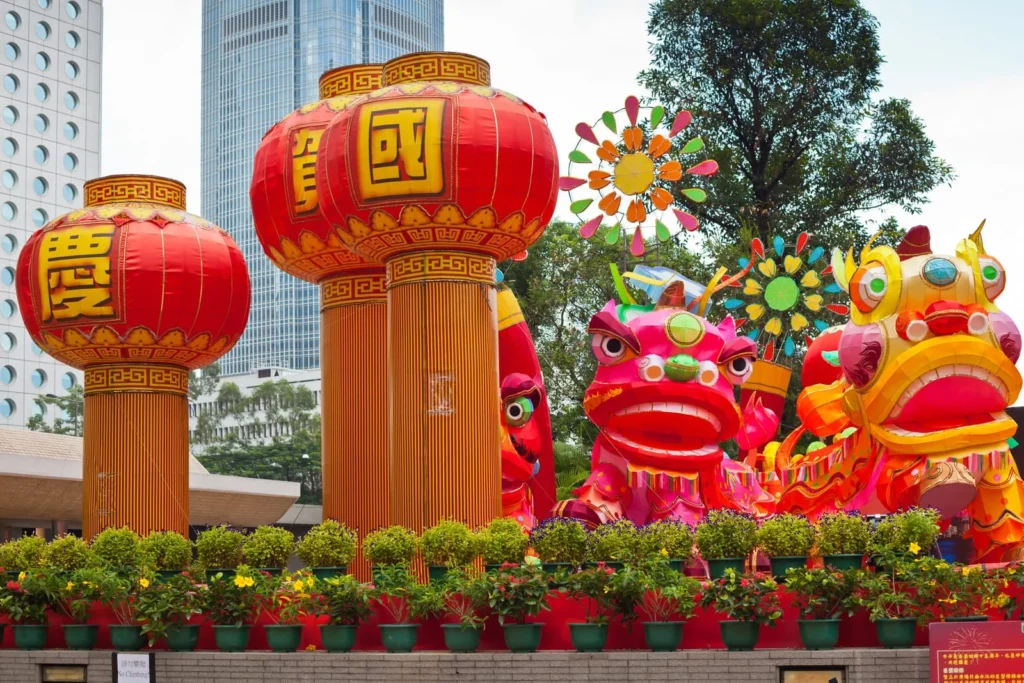 Traditional Lunar New Year decorations and dragon displays in Hong Kong, showing how public holidays shape festive shopping and citywide celebrations.